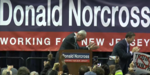 Murphy, left, and Norcross simultaneously bow in the direction of Pelosi.