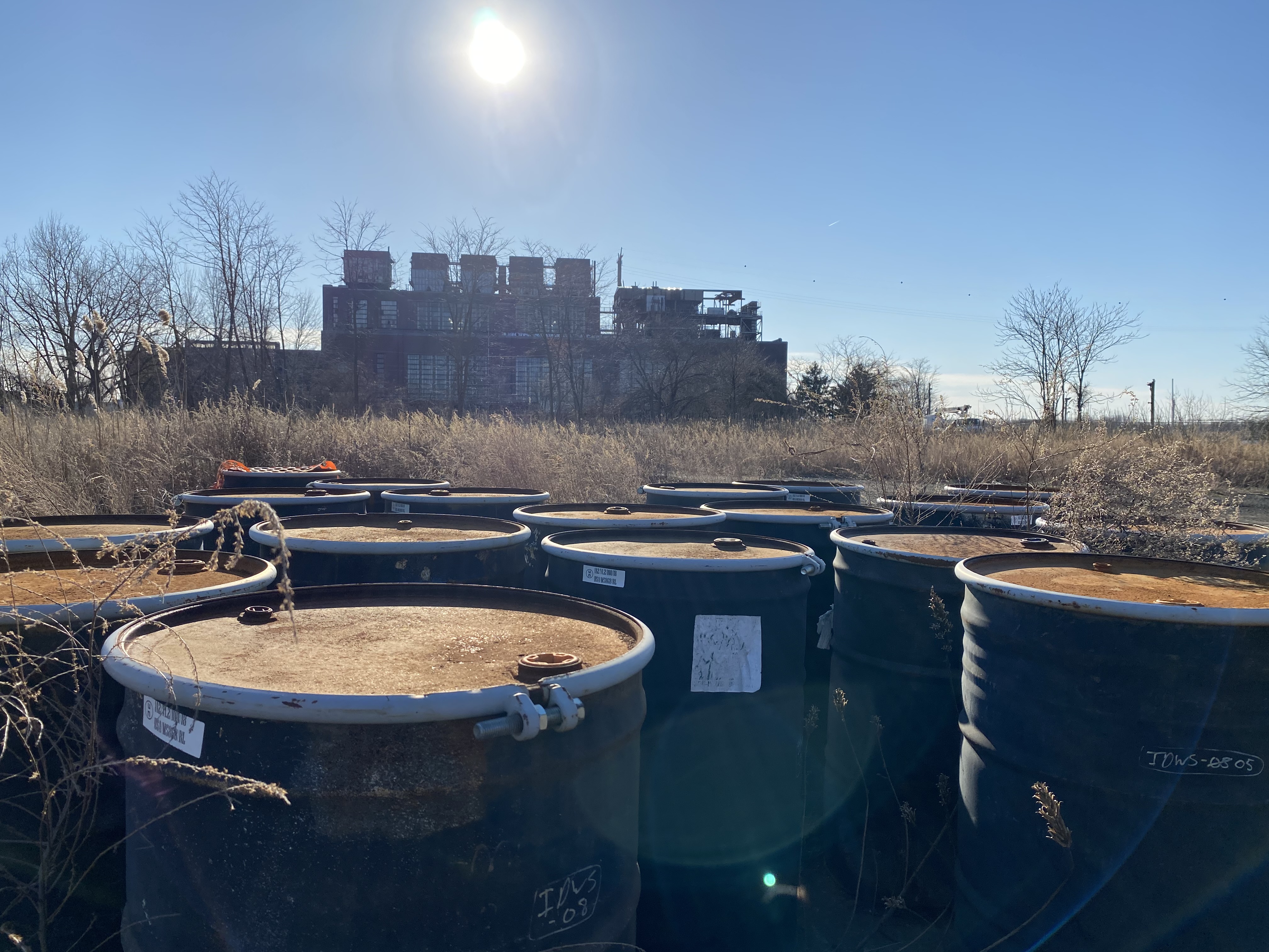 Not far from Burlington City’s picturesque downtown industrial waste lingers along the Delaware River coast. Photo credit Bob Hennelly