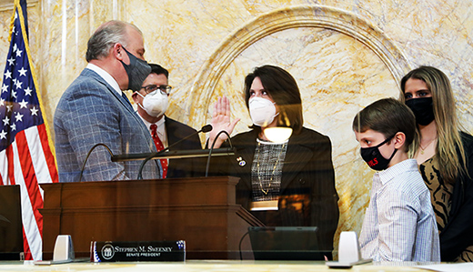 Schepisi assumes the oath of office.